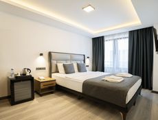 Delux Üç Kişilik Bağlantılı Oda