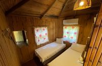 bungalow room with 2 person with 2 separate bed
