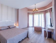 Villa Deluxe con Piscina in Comune