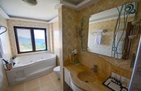 Deluxe Room with Jacuzzi and Fireplace for 3 Persons