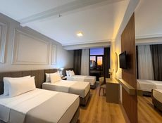 Deluxe Triple Kısmi Boğaz Manzaraları Triple Yataklı Oda