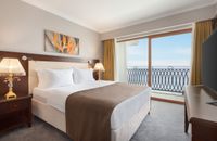 Suite familiar con 1 cama doble y vistas al mar