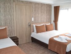 Chambre Triple avec Balcon