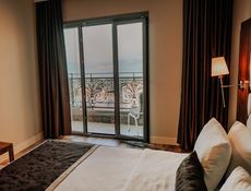 Kamer met zeezicht en balkon