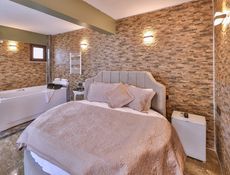 Premium Deluxe Çift Kişilik Jakuzili ve Şömineli Oda