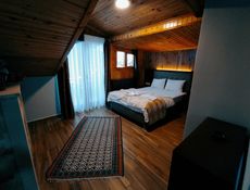 Zolderkamer met Sauna en Open Haard