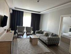 1+1 Grand Superior Aile Suit Deniz Manzaralı