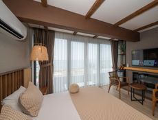 Deluxe Room with Partial Sea View