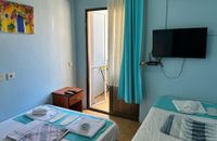 Üç Kişilik Standart Double Twin Balkonlu Oda