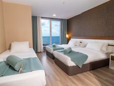 Deluxe Driepersoonskamer met Uitzicht op Zee