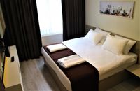 Сімейні двокімнатні чотиримісні апартаменти (2 x односпальні ліжка)