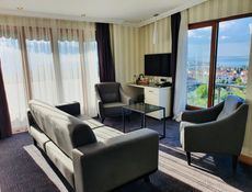 Junior Suite - Uitzicht op Zee - Balkon