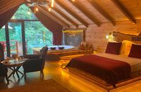 Sultan Room With Jacuzzi, Turkish Bath, Fireplace, Balcony, Stream view