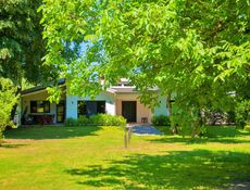 Villa con giardino con tre camere da letto