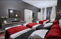 Deluxe Quadruple Room, City View