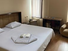 Chambre Standard avec balcon vue sur la ville