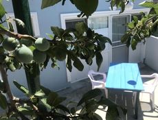 Corner patio room almond with partial bay view