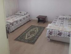 Garden floor room with partial bay view walnut