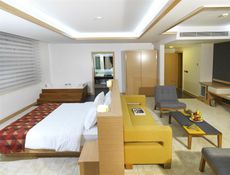 Habitación Deluxe con cama extragrande y jacuzzi