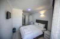 Deluxe Balkonlu Kısmi Deniz Manzaralı