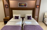 Deluxe-Zimmer mit 4 Einzelbetten