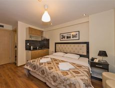 Un appartement avec une chambre