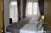 Deluxe Suite Zimmer mit Stadtblick für Dreibettzimmer
