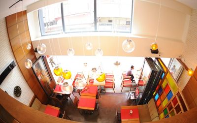 Casa Rosso Suites · 5