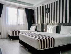 Deluxe Zimmer - Dreibettzimmer