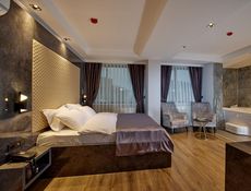 Номер Делюкс з двоспальним ліжком розміру "king -size" - джакузі