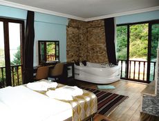 Deluxe kamer met jacuzzi en rivieruitzicht