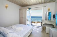 Kamer met balkon en zeezicht