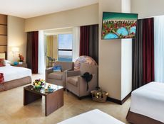 Sea View Family Room with Kitchenette and Balcony - One King bed and two Twin beds